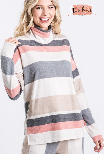 Striped print top featured in a turtle neckline